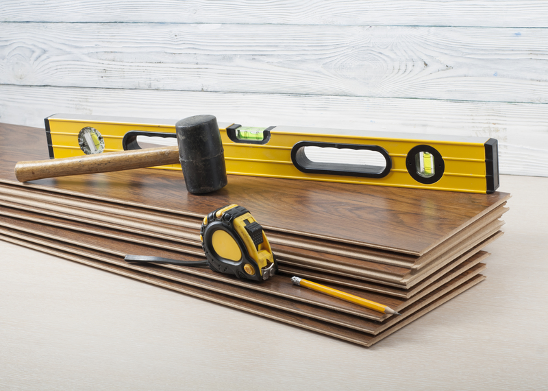 Tools for laying laminate flooring.Copy space for text.